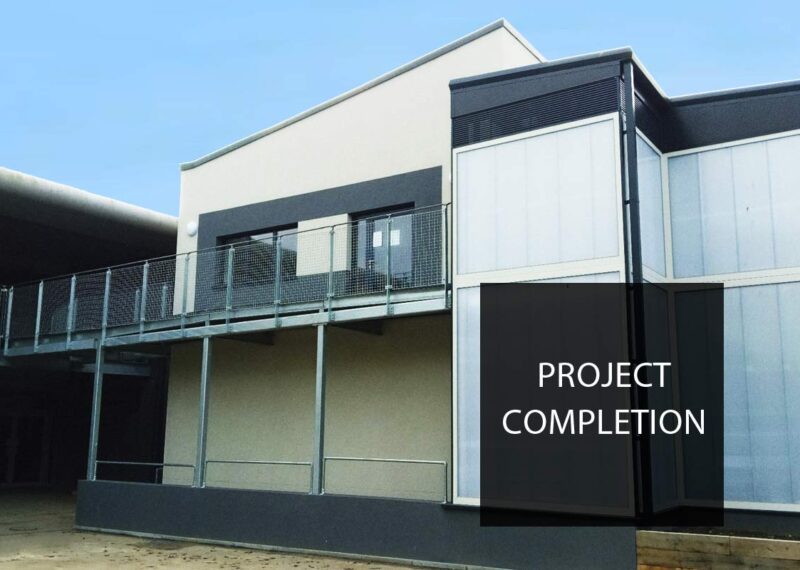 Image of new teaching block for Queen Elizabeth's Grammar School with text reading 'Project Completion'.