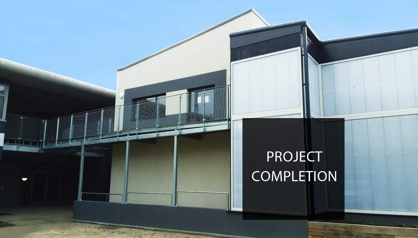 Image of new teaching block for Queen Elizabeth's Grammar School with text reading 'Project Completion'.